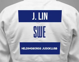 Judo GI with a backnumber showing the name Jun-Yan Lin from Heldingborgs Judoklubb