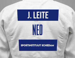 Judo GI with a backnumber showing the name Juwen Leite from Sportinstituut Schiedam