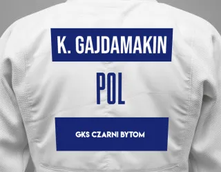 Judo GI with a backnumber showing the name Kaja Gajdamakin from GKS Czarni Bytom