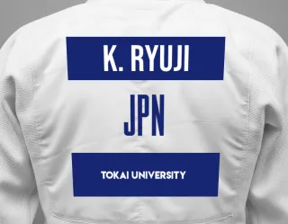 Judo GI with a backnumber showing the name Kaneko Ryuji from Tokai University
