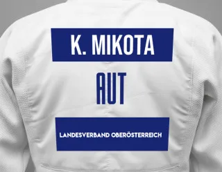 Judo GI with a backnumber showing the name Katharina Mikota from Landesverband Oberösterreich