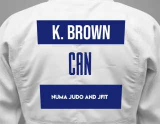 Judo GI with a backnumber showing the name Katherine Brown from NUMA Judo and JFIT