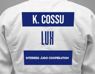 Judo GI with a backnumber showing the name Kenza Cossu from Interreg Judo Cooperation