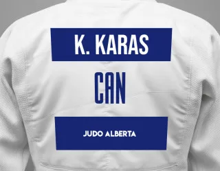 Judo GI with a backnumber showing the name Kondelia Odette Karas from Judo Alberta