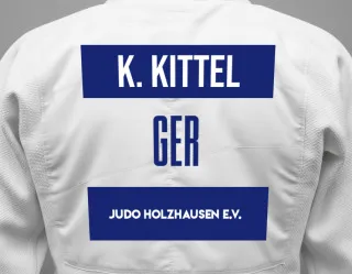 Judo GI with a backnumber showing the name Kora Kittel from Judo Holzhausen e.V.
