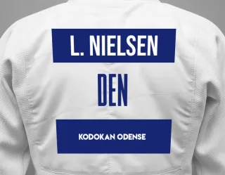 Judo GI with a backnumber showing the name Laurits Nielsen from Kodokan Odense