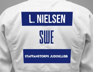 Judo GI with a backnumber showing the name Leia Rausek Nielsen from Staffanstorps Judoklubb