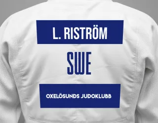 Judo GI with a backnumber showing the name Leia Riström from Oxelösunds Judoklubb