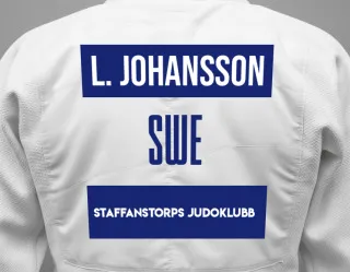 Judo GI with a backnumber showing the name Lisa Johansson from Staffanstorps Judoklubb