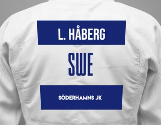 Judo GI with a backnumber showing the name Lo Håberg from Söderhamns JK