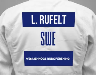 Judo GI with a backnumber showing the name Ludvig Rufelt from Wemmenhögs Budoförening