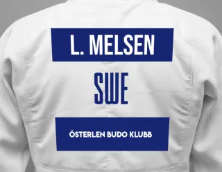 Judo GI with a backnumber showing the name Lykke Sandberg Melsen from Österlen Budo klubb
