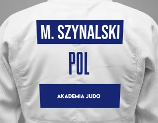 Judo GI with a backnumber showing the name Maciej Szynalski from Akademia Judo