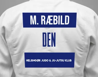 Judo GI with a backnumber showing the name Mads Ræbild from Helsingør Judo & Ju-Jutsu Klub