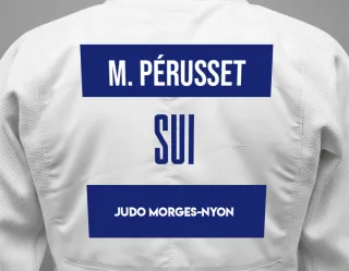 Judo GI with a backnumber showing the name Maeva Pérusset from Judo Morges-Nyon