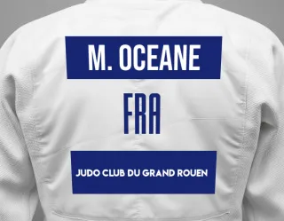 Judo GI with a backnumber showing the name Magnant Oceane from Judo Club du Grand Rouen