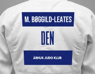 Judo GI with a backnumber showing the name Magnus Bøggild-leates from Århus Judo Klub