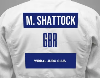 Judo GI with a backnumber showing the name Maisie Shattock from Wirral Judo Club