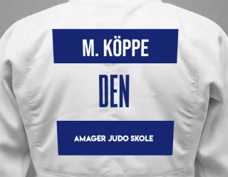 Judo GI with a backnumber showing the name Malte Köppe from Amager Judo Skole