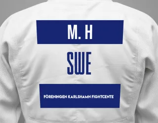 Judo GI with a backnumber showing the name Mano H from Föreningen Karlshamn Fightcente