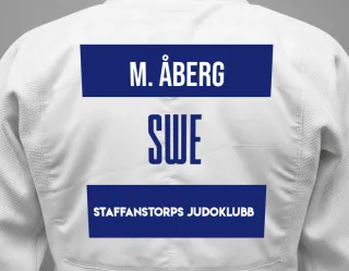 Judo GI with a backnumber showing the name Marcus Åberg from Staffanstorps Judoklubb