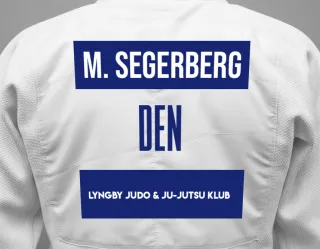 Judo GI with a backnumber showing the name Martin Segerberg from Lyngby Judo & Ju-Jutsu Klub