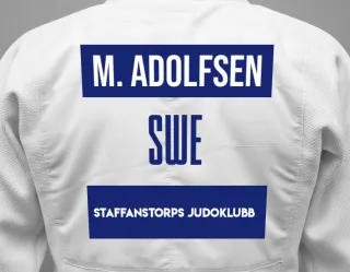 Judo GI with a backnumber showing the name Matilda Adolfsen from Staffanstorps Judoklubb