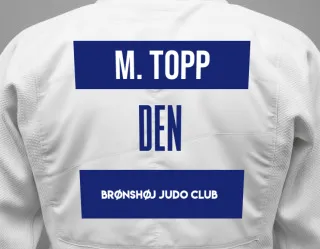 Judo GI with a backnumber showing the name Max Fog Topp from Brønshøj Judo Club