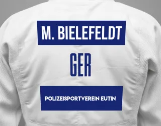 Judo GI with a backnumber showing the name Maximilian Bielefeldt from Polizeisportverein Eutin