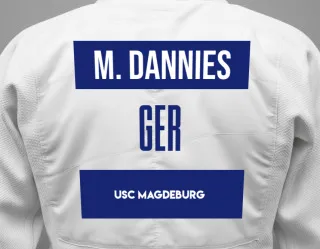 Judo GI with a backnumber showing the name Meike Dannies from USC Magdeburg