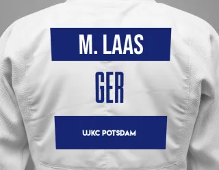 Judo GI with a backnumber showing the name Merle Laas from UJKC Potsdam