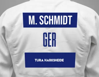 Judo GI with a backnumber showing the name Mieke Schmidt from TURA Harksheide