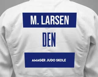 Judo GI with a backnumber showing the name Miguèl Larsen from Amager Judo Skole