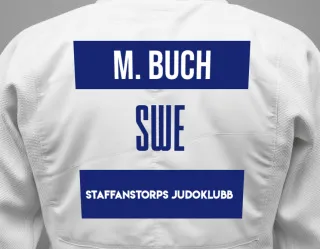 Judo GI with a backnumber showing the name Mikael Buch from Staffanstorps Judoklubb