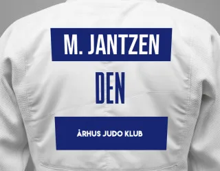 Judo GI with a backnumber showing the name Mikkel Kesanen Jantzen from Århus Judo Klub