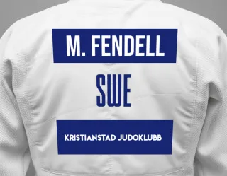 Judo GI with a backnumber showing the name Millie Fendell from Kristianstad Judoklubb