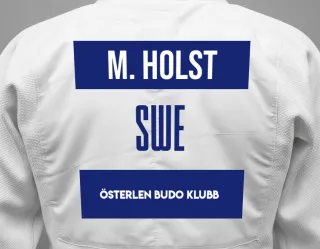 Judo GI with a backnumber showing the name Milton Holst from Österlen Budo klubb