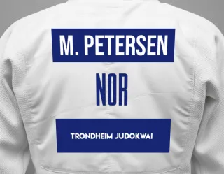 Judo GI with a backnumber showing the name Minna Petersen from Trondheim Judokwai