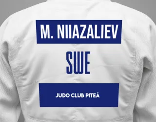 Judo GI with a backnumber showing the name Mirbek Niiazaliev from Judo Club Piteå