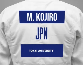 Judo GI with a backnumber showing the name Moku Kojiro from Tokai University