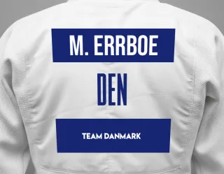 Judo GI with a backnumber showing the name Morgan Mufasa Errboe from Team Danmark