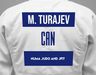 Judo GI with a backnumber showing the name Muhammad Turajev from NUMA Judo and JFIT