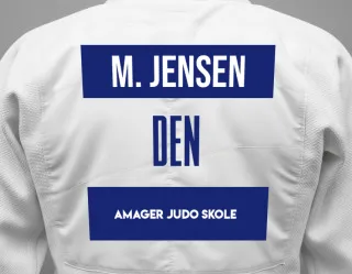 Judo GI with a backnumber showing the name Mustefa Jensen from Amager Judo Skole