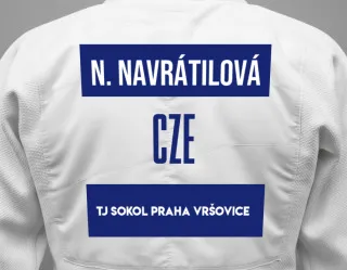 Judo GI with a backnumber showing the name Nela Navrátilová from TJ Sokol Praha Vršovice
