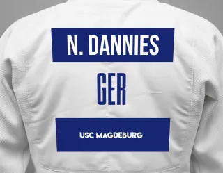 Judo GI with a backnumber showing the name Nelda Dannies from USC Magdeburg
