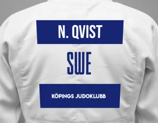 Judo GI with a backnumber showing the name Nell Qvist from Köpings Judoklubb