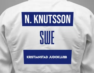 Judo GI with a backnumber showing the name Nellie Knutsson from Kristianstad Judoklubb
