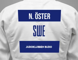 Judo GI with a backnumber showing the name Nellie öster from Judoklubben Budo