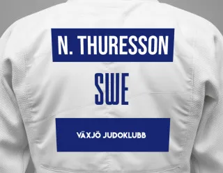 Judo GI with a backnumber showing the name Nemi Thuresson from Växjö Judoklubb