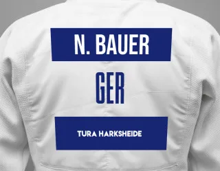Judo GI with a backnumber showing the name Nicole Bauer from TURA Harksheide